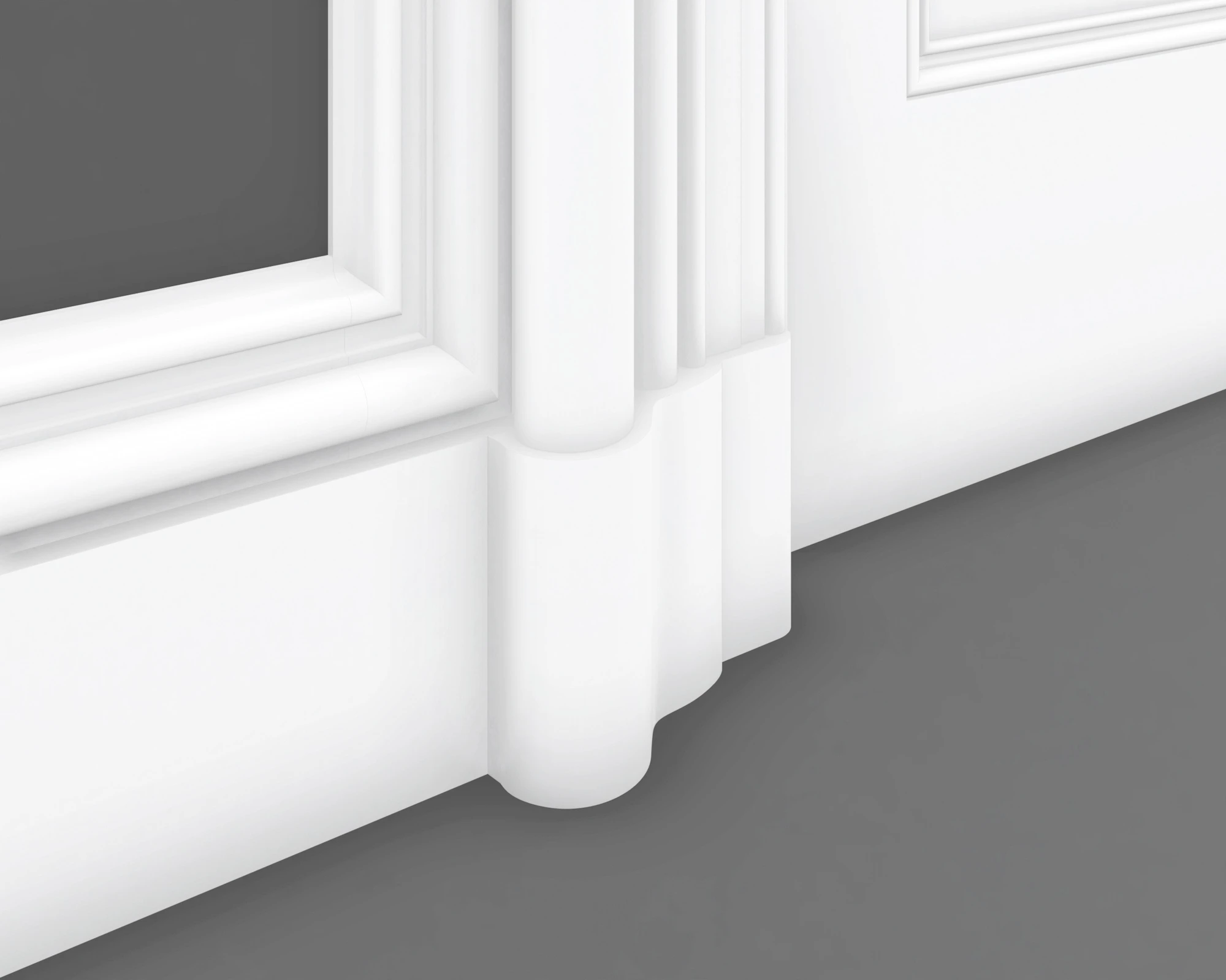 Close-up of Second Empire door casing, wall moulding and rounded trim detail at the base